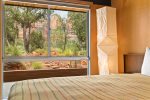 Queen bed with red rock views